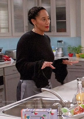 Rainbow's black ruffle trim sweater and colorblock trousers on Black-ish