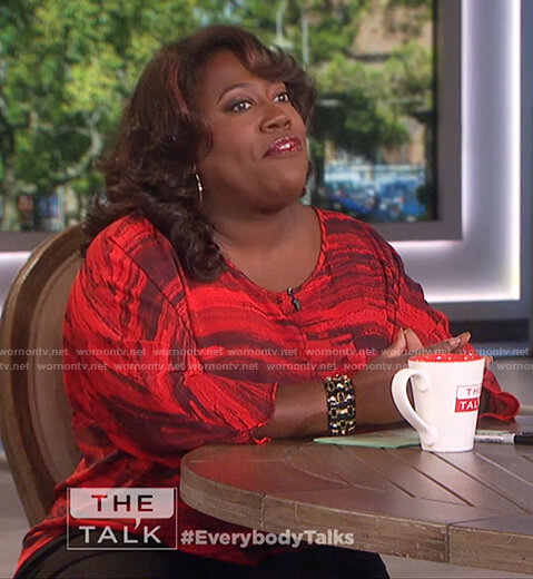 Sheryl’s red print top on The Talk