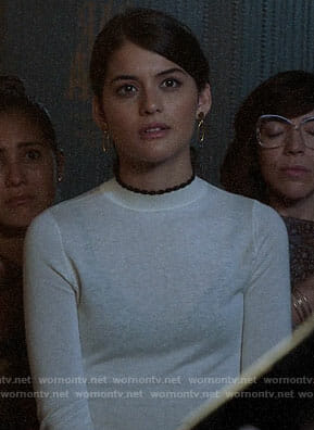 Sabrina’ sweater with black scalloped trim on The Mick