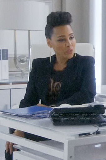 Tegan’s leopard print top with lace on How to Get Away with Murder