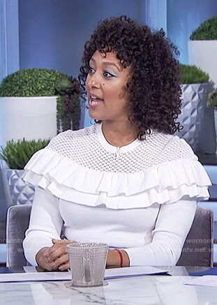 Tamera’s white textured ruffle sweater on The Real