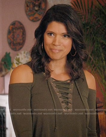 Xiomara’s green lace-up cold-shoulder top on Jane the Virgin