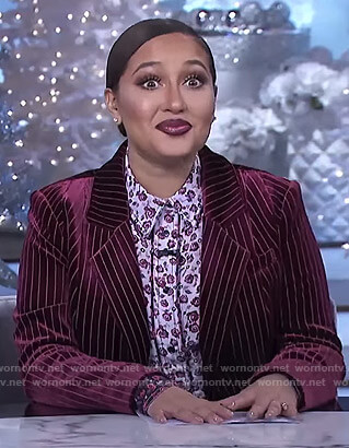 Adrienne’s white floral shirt and red velvet blazer on The Real