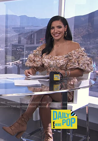Julissa’s beige ruffled dress and lace-up boots on E! News Daily Pop