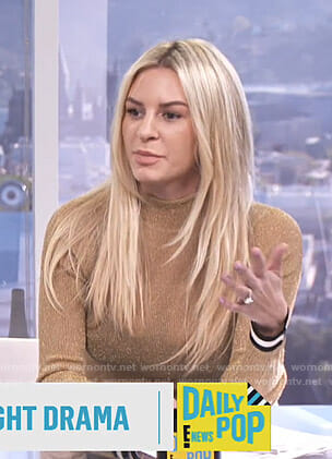 Morgan’s gold mockneck top on E! News Daily Pop