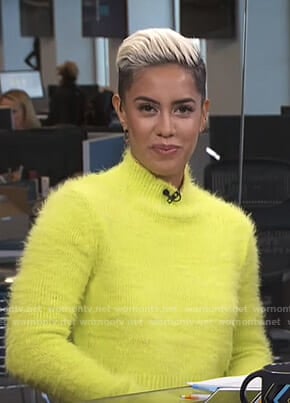 Sibley’s yellow fluffy sweater on Live from E!