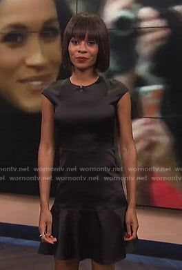 Zuri’s black satin flare dress on E! News