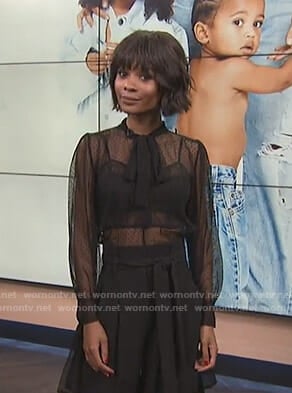 Zuri’s black tie neck mesh blouse on E! News