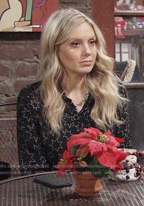 Abby’s black star print shirtdress on The Young and the Restless