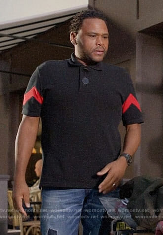 Andre's black polo shirt with red striped sleeves on Black-ish
