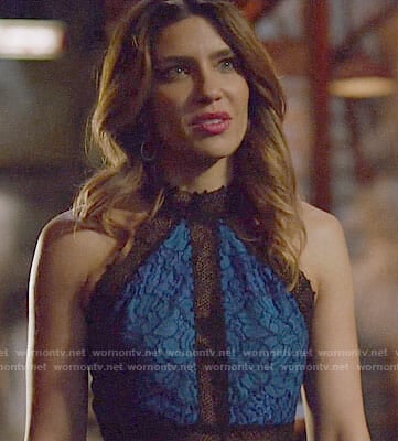 Dina’s blue lace high neck dress on Arrow