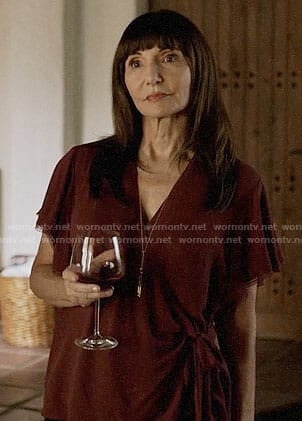 Gail’s burgundy wrap top on The Last Man on Earth