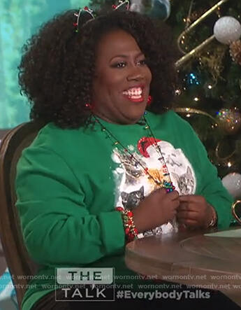 Sheryl's green cat print christmas sweater on The Talk