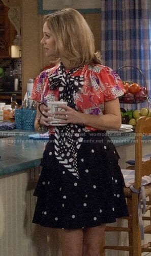 Kimmy’s pink floral top and polka dot skirt on Fuller House