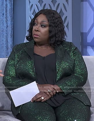 Loni’s green metallic suit on The Real