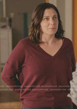 Rebecca’s red v-neck sweater on Crazy Ex-Girlfriend