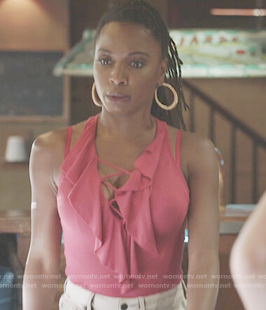 Veronica’s pink lace-up ruffle bodysuit on Shameless