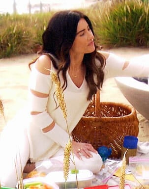 Steffy’s white sweater with cutout sleeves on The Bold and the Beautiful