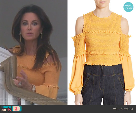 WornOnTV: Kyle’s yellow smocked cold-shoulder top on The Real