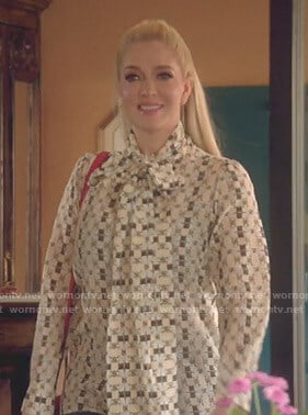 Erika's logo print tie neck blouse on The Real Housewives of Beverly Hills