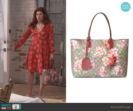 Medium GG Blooms Reversible Canvas & Leather Tote by Gucci worn by Grace Adler (Debra Messing) on Will and Grace