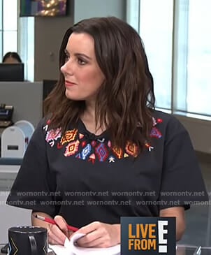 Melanie’s black embroidered t-shirt on Live from E!