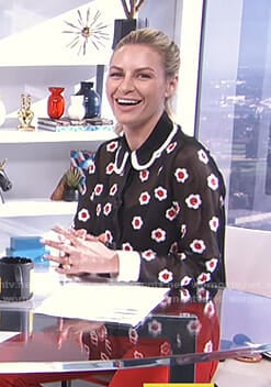 Morgan’s black floral sheer blouse on E! News Daily Pop