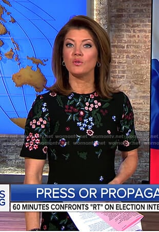 Norah’s black floral short sleeve dress on CBS This Morning