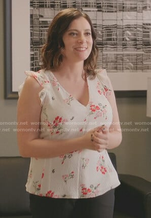 Rebecca’s white floral ruffled top on Crazy Ex-Girlfriend