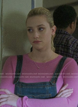 Betty's pink sweater and denim overalls on Riverdale