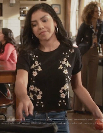 Poppy’s black floral embroidered t-shirt on The Fosters