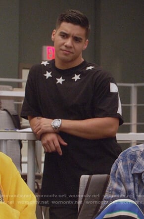 Vivek's black star patch shirt on Grown-ish