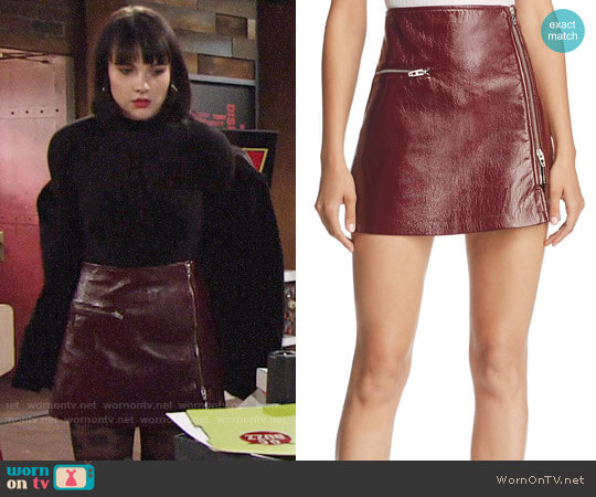 Blank NYC Faux Patent Zip Mini Skirt worn by Tessa Porter (Cait Fairbanks) on The Young and the Restless