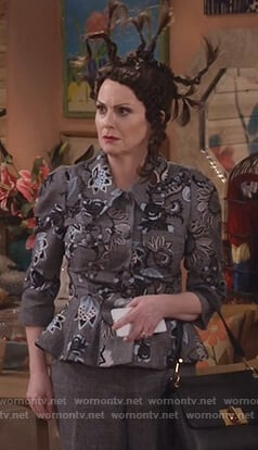 Karen’s gray floral embroidered peplum jacket on Will and Grace