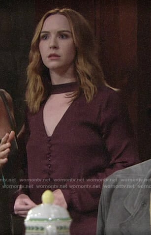 Mariah’s burgundy choker blouse on The Young and the Restless