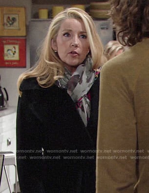 Nikki’s black coat and butterfly print scarf on The Young and the Restless