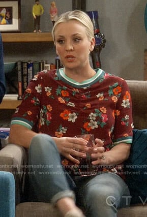 Penny's red floral top with green trim on The Big Bang Theory
