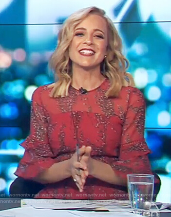 Carrie’s red floral print dress on The Project