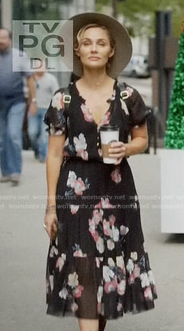 Scarlett’s black floral midi dress and hat on Nashville