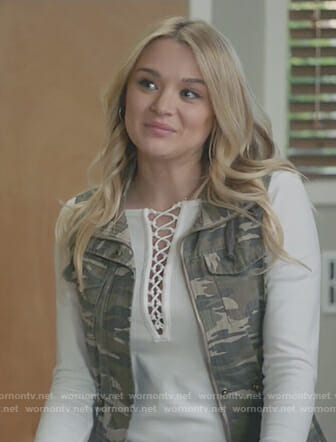 Clementine’s white lace-up top and camo vest on Life in Pieces