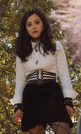 Nico’s white studded top and corset belt on Marvel’s Runaways