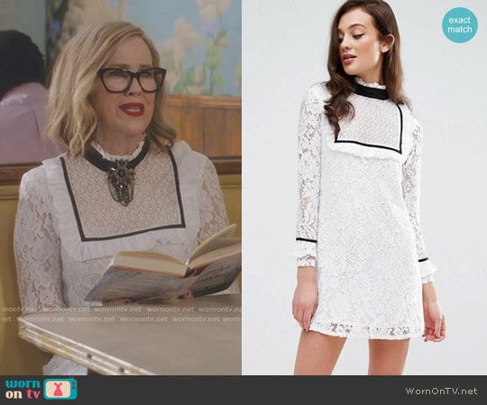 Bib Front Dress With Contrast Trim by Fashion Union worn by Moira Rose (Catherine O'Hara) on Schitts Creek