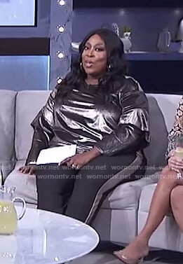 Loni’s metallic ruffled sleeve top and side striped pants on The Real