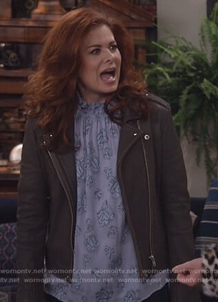 Grace’s black leather moto jacket and floral top on Will and Grace