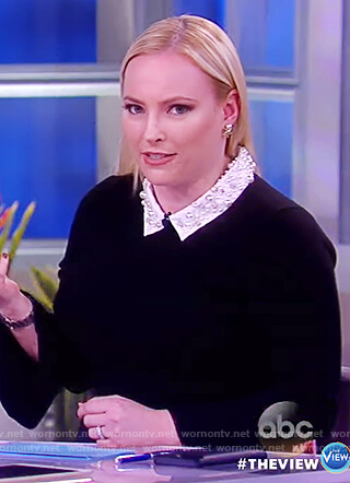 Meghan’s black embellished sweater and floral skirt on The View