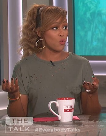 Eve’s green distressed tee and palm tree skirt on The Talk