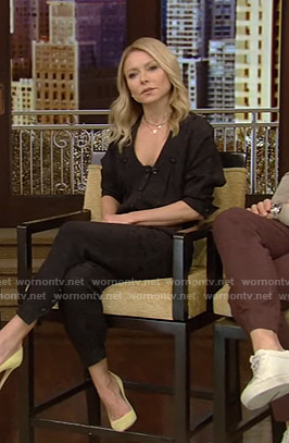 Kelly’s black button front jumpsuit on Live with Kelly and Ryan