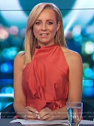 Carrie’s orange sleeveless asymmetric top on The Project