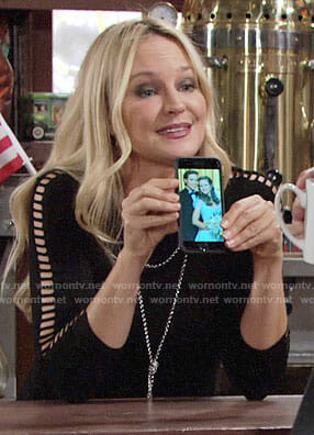 Sharon’s black ladder-sleeve top on The Young and the Restless