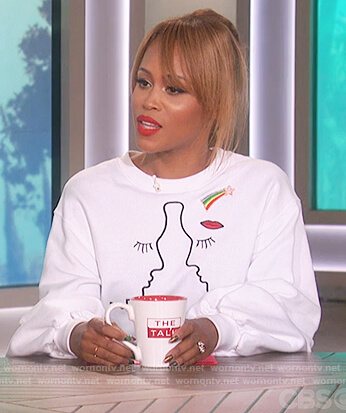 Eve’s white embroidered sweatshirt on The Talk